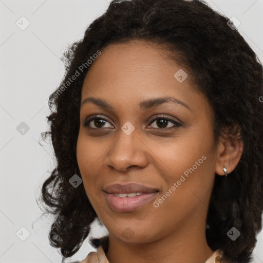 Joyful black young-adult female with medium  brown hair and brown eyes