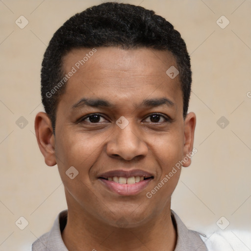 Joyful black young-adult male with short  black hair and brown eyes