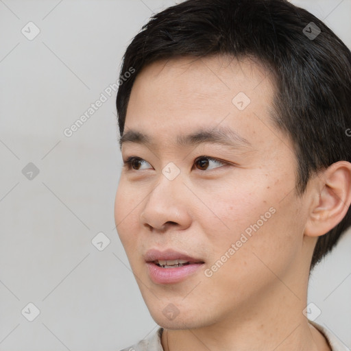 Neutral white young-adult male with short  black hair and brown eyes