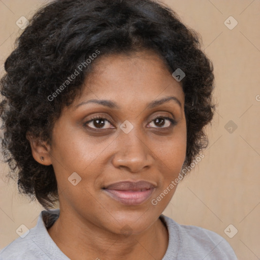 Joyful latino adult female with short  brown hair and brown eyes