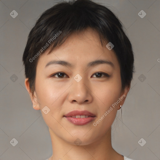 Joyful asian young-adult female with short  brown hair and brown eyes