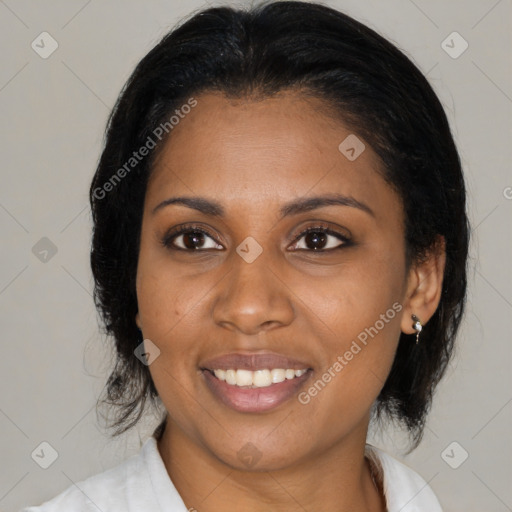 Joyful latino young-adult female with medium  brown hair and brown eyes