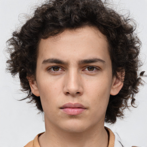 Neutral white young-adult male with medium  brown hair and brown eyes