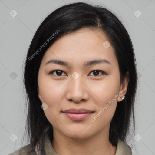 Joyful latino young-adult female with medium  brown hair and brown eyes