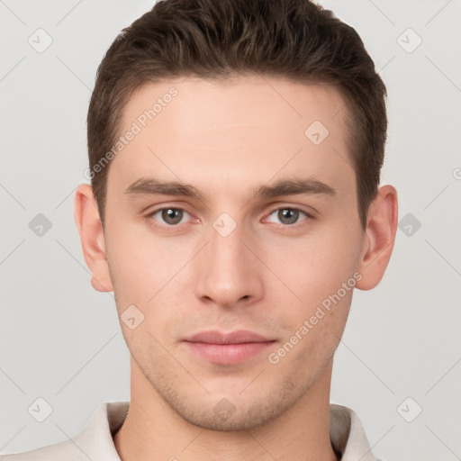 Neutral white young-adult male with short  brown hair and brown eyes