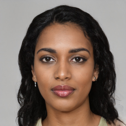Neutral black young-adult female with long  black hair and brown eyes