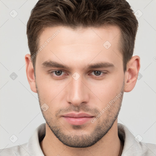 Neutral white young-adult male with short  brown hair and brown eyes