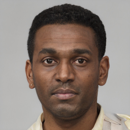 Neutral black young-adult male with short  black hair and brown eyes