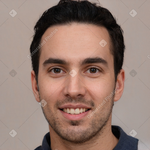 Joyful white young-adult male with short  black hair and brown eyes