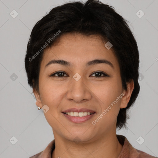 Joyful asian young-adult female with short  brown hair and brown eyes