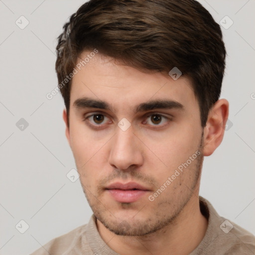 Neutral white young-adult male with short  brown hair and brown eyes