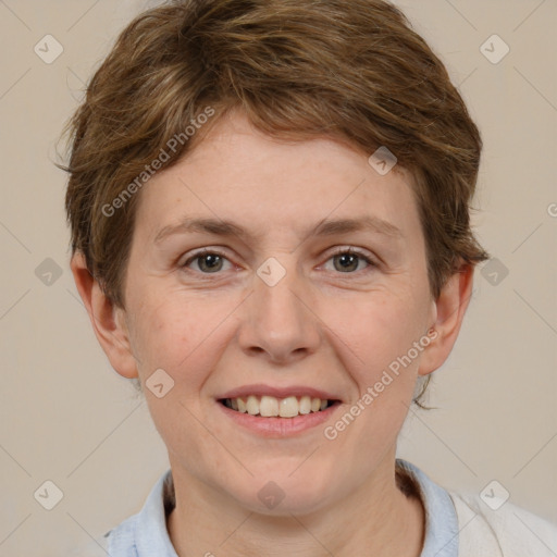 Joyful white adult female with short  brown hair and brown eyes