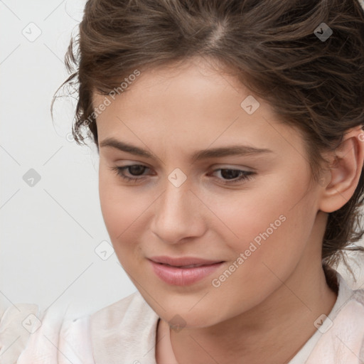 Joyful white child female with medium  brown hair and brown eyes