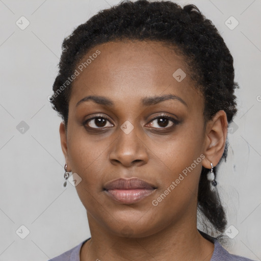 Neutral black young-adult female with short  brown hair and brown eyes