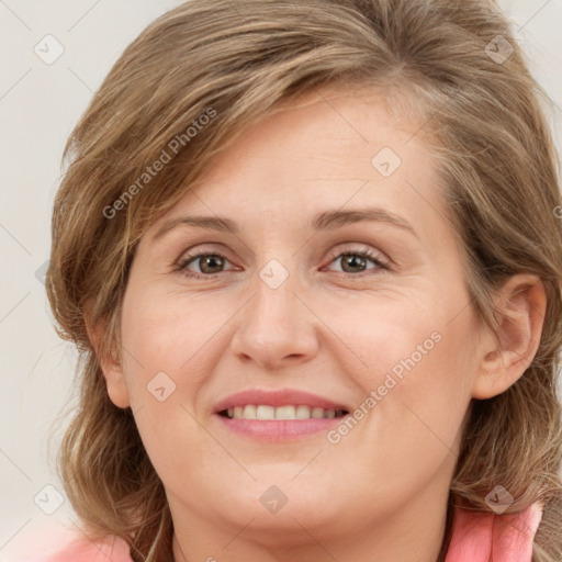 Joyful white young-adult female with medium  brown hair and blue eyes