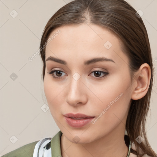 Neutral white young-adult female with long  brown hair and brown eyes