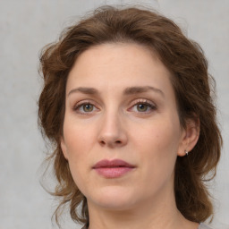 Neutral white young-adult female with medium  brown hair and green eyes