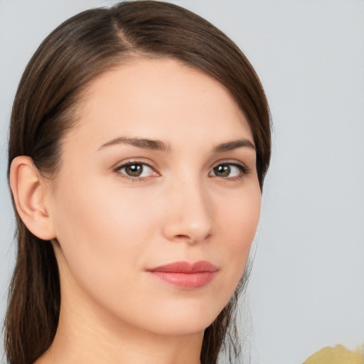 Neutral white young-adult female with long  brown hair and brown eyes