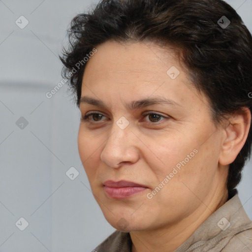 Joyful white adult female with short  brown hair and brown eyes