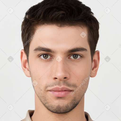 Neutral white young-adult male with short  brown hair and brown eyes