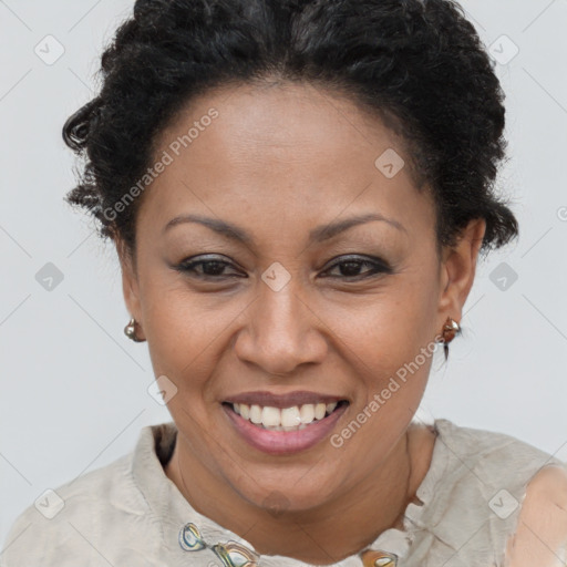 Joyful latino adult female with short  brown hair and brown eyes