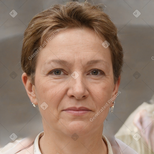 Joyful white adult female with short  brown hair and brown eyes