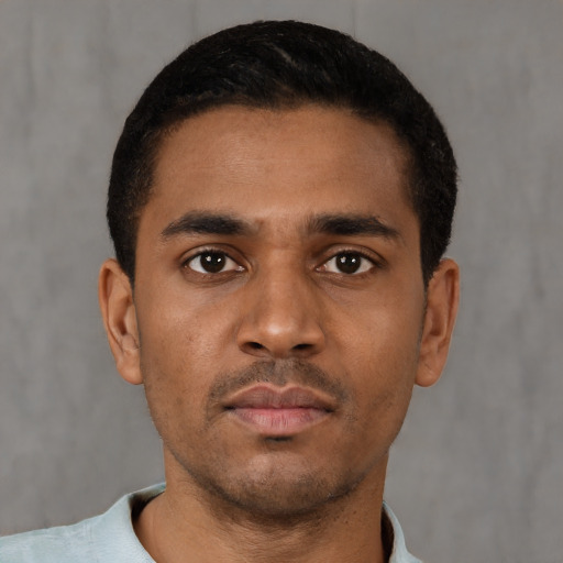 Neutral black young-adult male with short  black hair and brown eyes