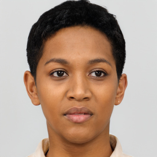Joyful latino young-adult female with short  black hair and brown eyes