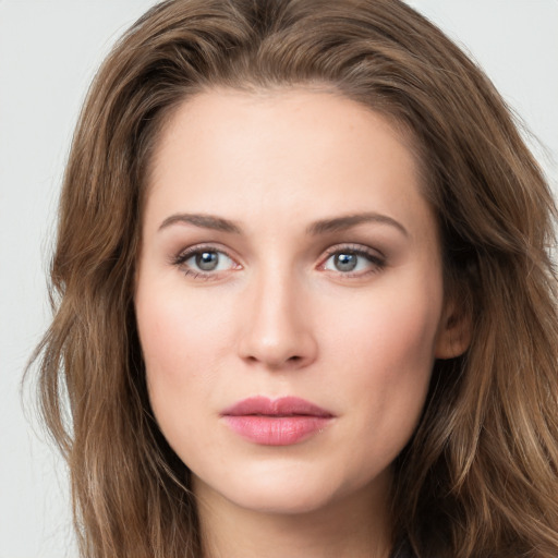 Neutral white young-adult female with long  brown hair and grey eyes