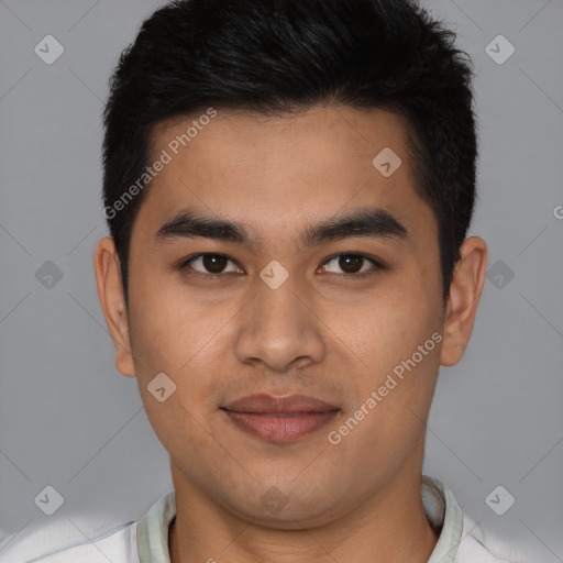 Joyful latino young-adult male with short  brown hair and brown eyes