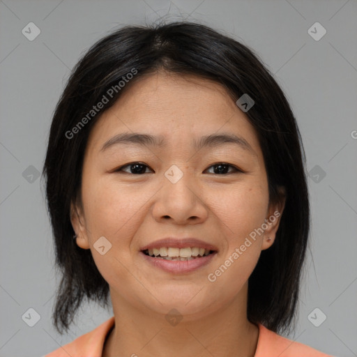 Joyful asian young-adult female with medium  brown hair and brown eyes