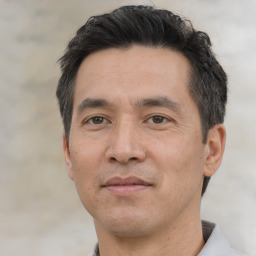 Neutral asian adult male with short  black hair and brown eyes