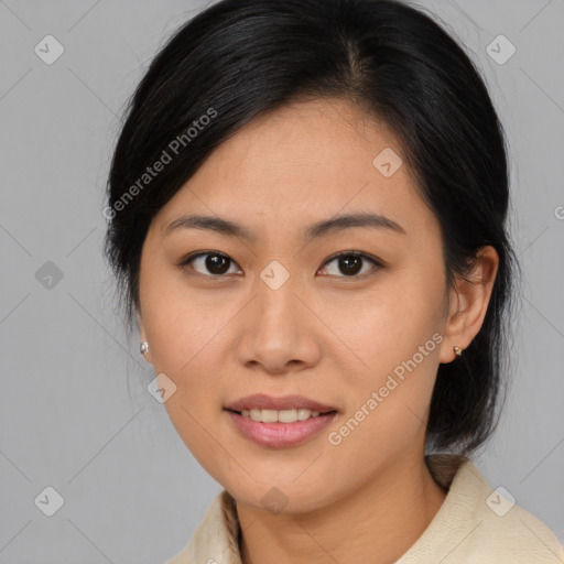 Joyful asian young-adult female with medium  brown hair and brown eyes