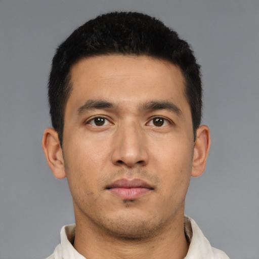 Neutral latino young-adult male with short  black hair and brown eyes
