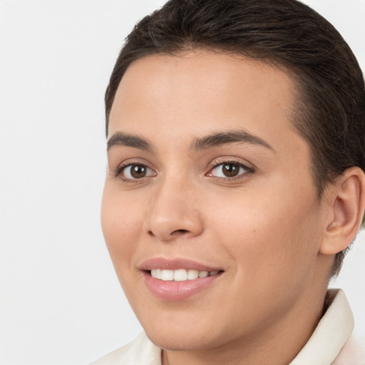 Joyful white young-adult female with short  brown hair and brown eyes