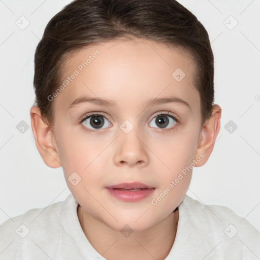 Joyful white child female with short  brown hair and brown eyes