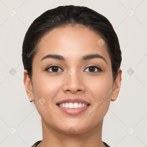 Joyful latino young-adult female with short  brown hair and brown eyes