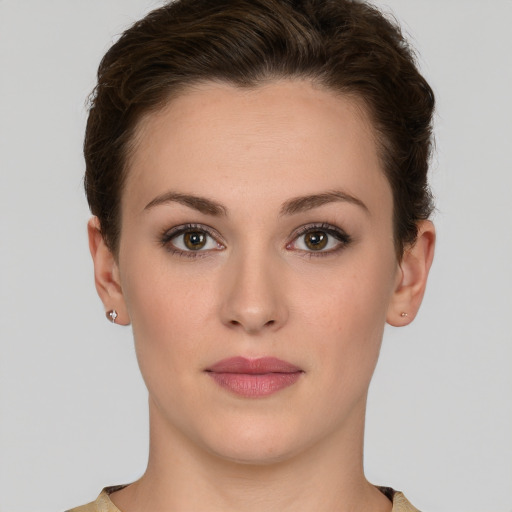 Neutral white young-adult female with short  brown hair and brown eyes