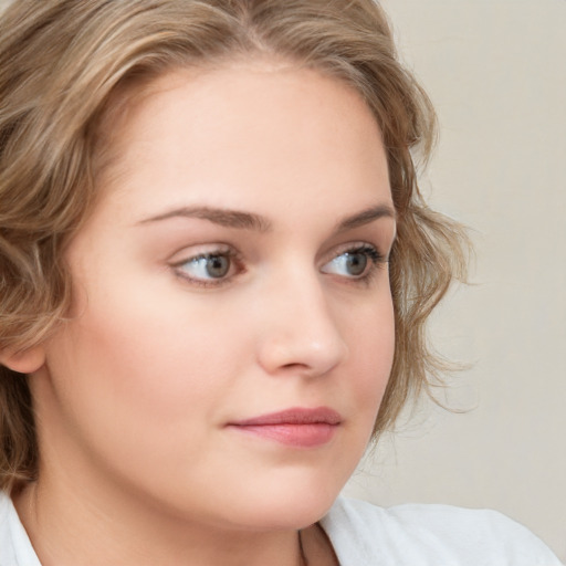 Neutral white young-adult female with medium  brown hair and blue eyes