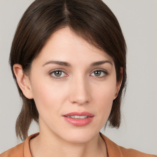 Neutral white young-adult female with medium  brown hair and brown eyes