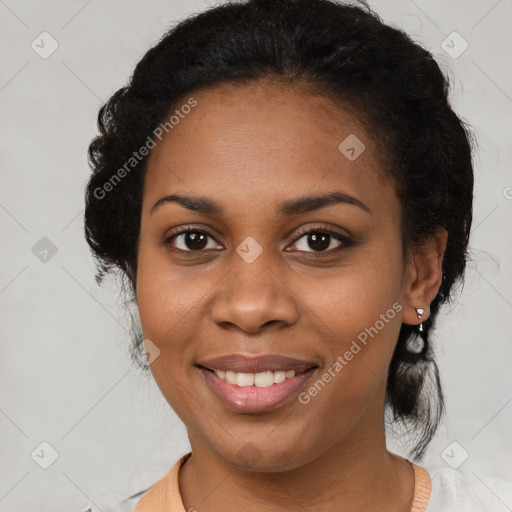 Joyful black young-adult female with medium  black hair and brown eyes