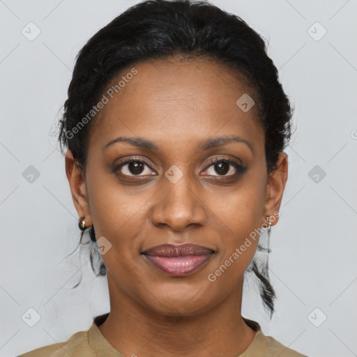 Joyful black young-adult female with short  brown hair and brown eyes
