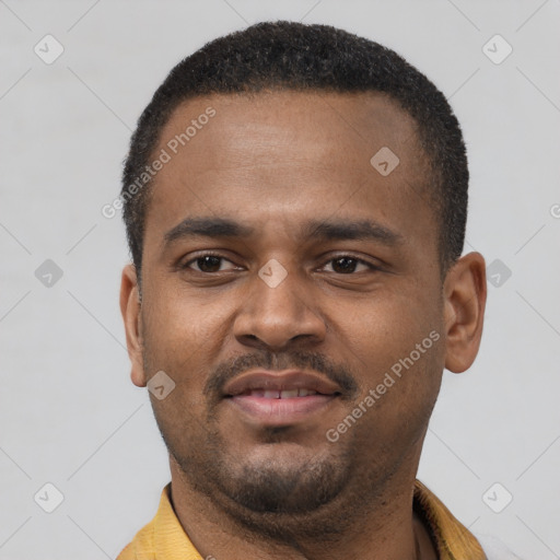 Neutral latino young-adult male with short  brown hair and brown eyes