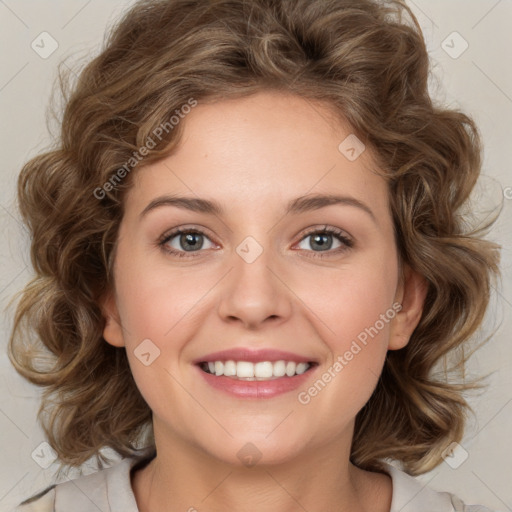 Joyful white young-adult female with medium  brown hair and green eyes