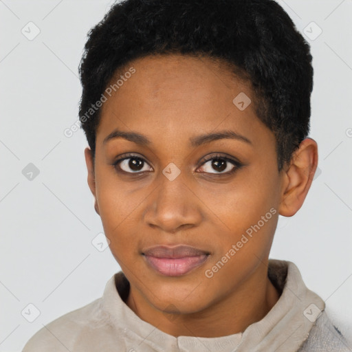 Joyful black young-adult female with short  black hair and brown eyes