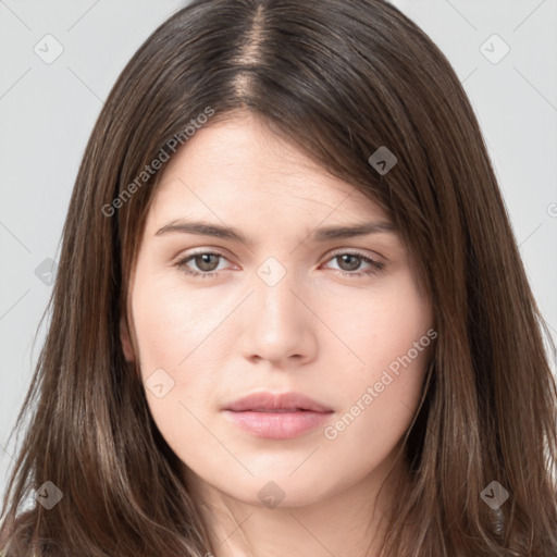 Neutral white young-adult female with long  brown hair and brown eyes