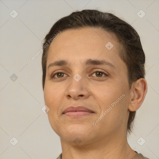 Joyful white adult female with short  brown hair and brown eyes