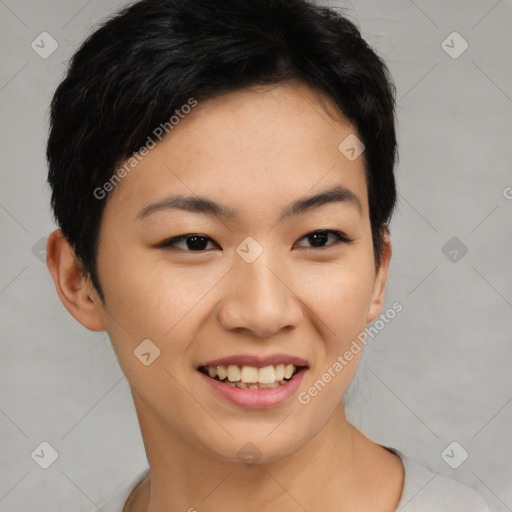 Joyful asian young-adult female with short  black hair and brown eyes