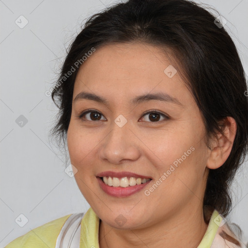 Joyful white young-adult female with medium  brown hair and brown eyes