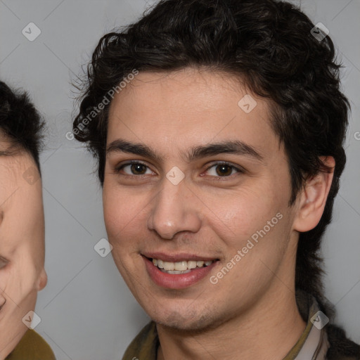 Joyful white young-adult male with medium  brown hair and brown eyes